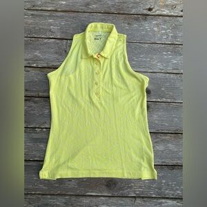 Woman's yellow Nike Golf Sport Dri-Fit Size L sleeveless Polo top.
